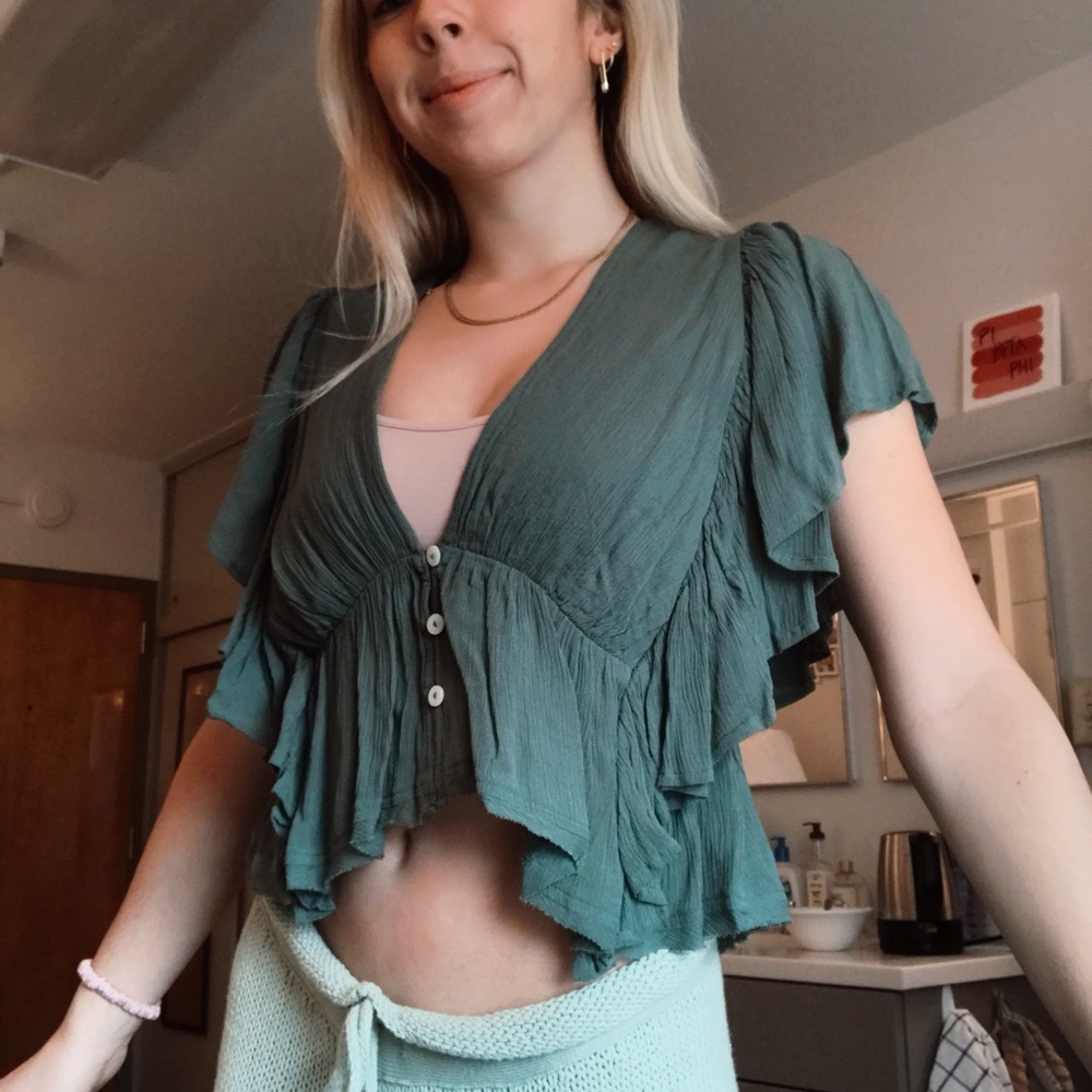 Free people flowy green top.